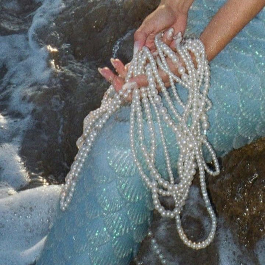 custom complex ocean/seafoam necklace (blue, black, white, stars)