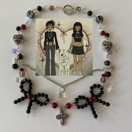 complex gothic bow necklace