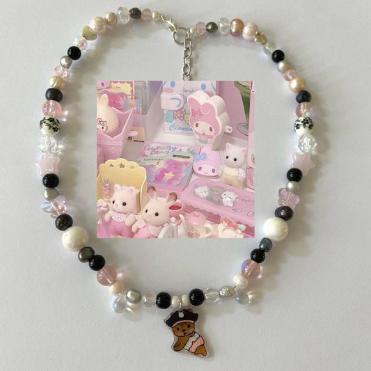 calico critters “pirate baby” necklace