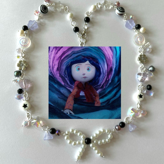 coraline tunnel of secrets necklace